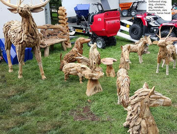 driftwood stag and other driftwood animals on show ground