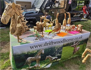 driftwood horse head, ducks, pigs, reindeer