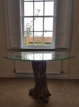 beautiful driftwood dining table with round glass top
