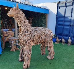 teak root alpaca sculpture